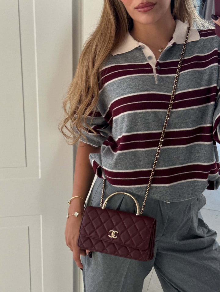 סוודר פסים בעיצוב צווארון פולו