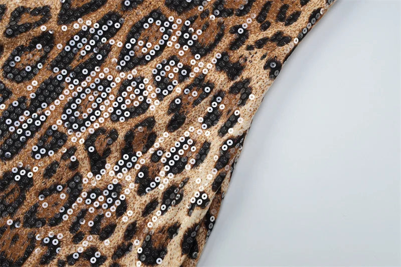 שמלת מידי צמודה בעיצוב פייטים מנומר ותחרה - רוקסי