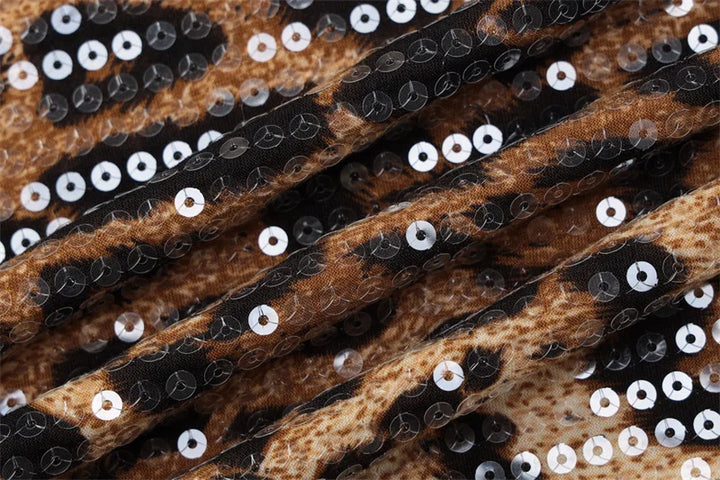 שמלת מידי צמודה בעיצוב פייטים מנומר ותחרה - רוקסי