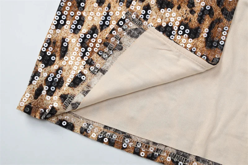 שמלת מידי צמודה בעיצוב פייטים מנומר ותחרה - רוקסי