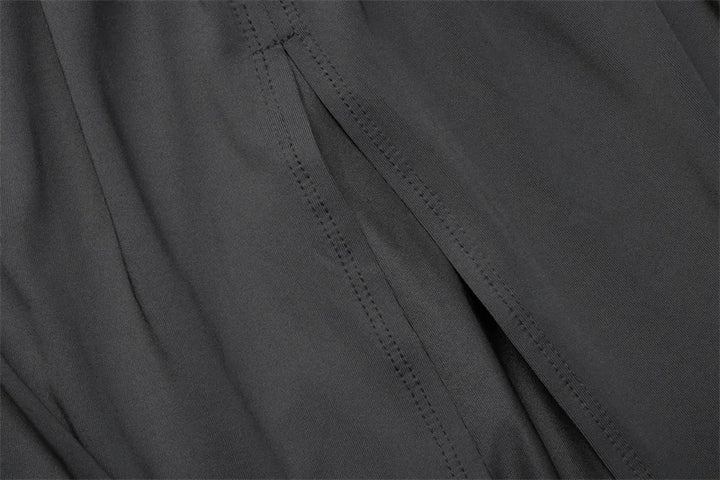 שמלת מקסי בעיצוב כתפיה אחת ושסע בעיטור כיווצים ואבזם - וולדה